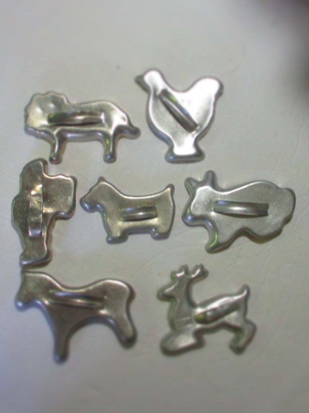 7 Vintage Tin Cookie Cutters from the 1950's.